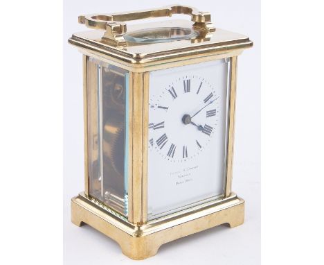 A French brass cased carriage clock retailed by Gibson of Belfast,
height 4.6".