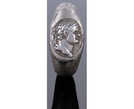 A Roman silver cameo-cast ring,
1st-2nd century AD with portrait design, 13.7grams.
