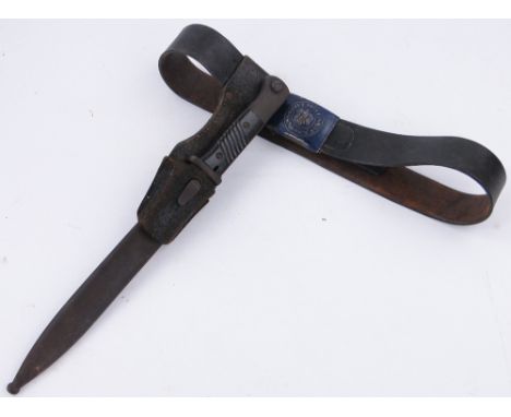 A Nazi bayonet,
blade length 10", in scabbard with belt and belt buckle.