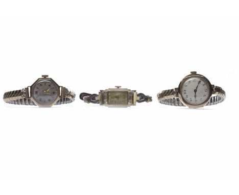 THREE LADY'S MANUAL WIND WRIST WATCHEScomprising a nine carat gold Buren example, signed Buren Grand Prix movement, the round
