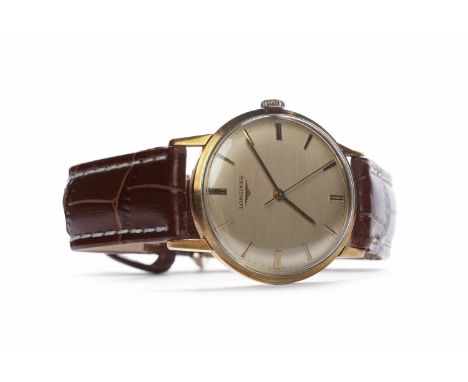 GENTLEMAN'S LONGINES MANUAL WIND WRIST WATCHthe round champagne coloured dial with applied gold coloured baton numerals, the 