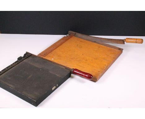 20th century vintage 'Johnsons of Hendon' cast metal guillotine together with a wooden example 