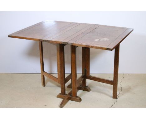 20th century rectangular oak drop leaf side table, H 71cm, W 76cm, D 25cm