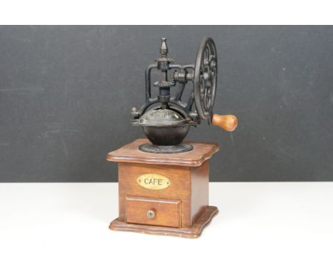 Vintage French coffee grinder, with iron mechanism and wooden base having ' Cafe ' label and single drawer,  28cm high