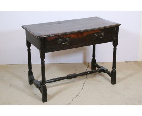 Early 20th century oak small side table with one long single drawer, drop handles and turned legs, H 66cm, W 90cm, D 46cm