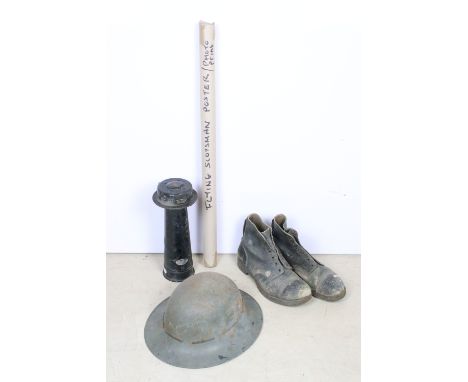 WWII military helmet and boots together with a Bosch FK 12 B horn and a Flying Scotsman poster 