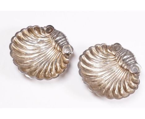 A pair of fully hallmarked sterling silver scalloped salts, assay marked for Birmingham and maker marked for Mitchell Bosley 