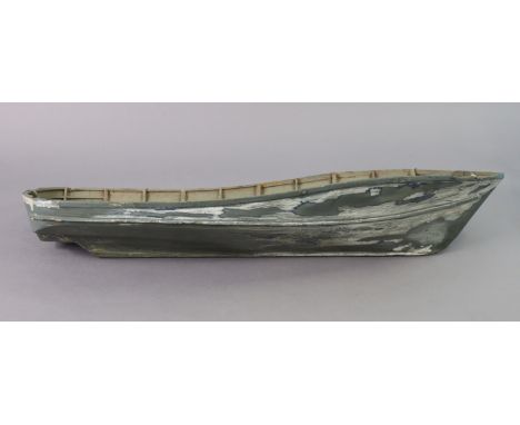 A large grey-finish fibreglass model boat, 52½” long. 