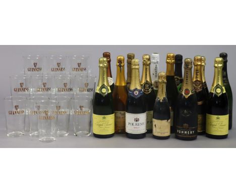 Fifteen various bottles of Champagne &amp; sparkling wine, all with contents; &amp; a set of twelve “Guinness” pint glasses.