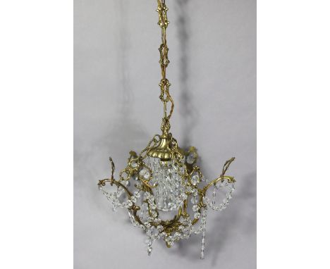 A bronzed metal five-Branch ceiling light fitting hung with cut-glass prism drops &amp; strands-of-beads, 12” wide x 10” high