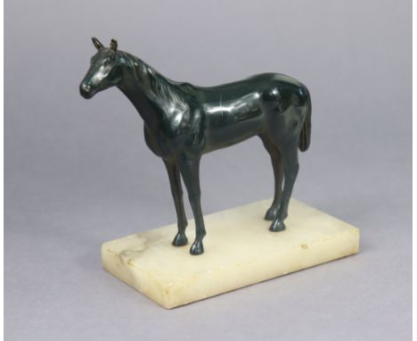 A spelter model of a standing horse mounted on an onyx plinth, 17.5cm wide x 16.5cm high. 