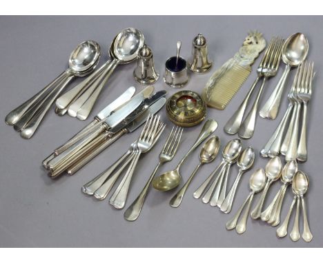 A quantity of plated flatware &amp; cutlery; a condiment set; a brass &amp; red enamel travelling timepiece.