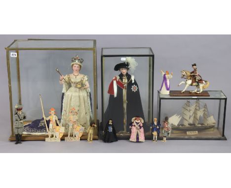 Two Queen Elizabeth II dolls, each in a glazed case; together with eight various other dolls &amp; figures; &amp; a model of 