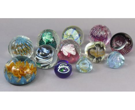 Twelve various Caithness glass paperweights.