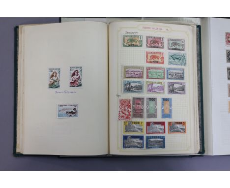 A good collection of Portuguese colonial stamps in one album; another of Batum, Danzig, Egypt, French colonies, Fiume, etc.; 