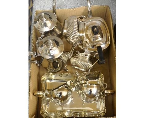 An EPNS three piece boat shaped tea service; another silver plated four piece tea service; a pierced cake basket; etc