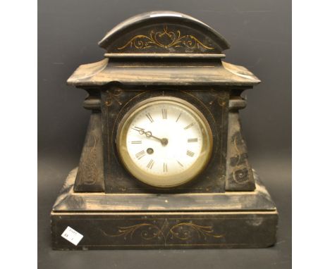 A late 19th century French black slate mantel clock, arched pediment, white enamel dial, Roman numerals, twin winding holes, 