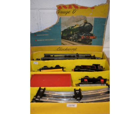 A Hornby O gauge clockwork Tank Goods, No45 train set, 0-4-0 tank engine, BR black livery , No 3/82011, Shell petrol tanker, 