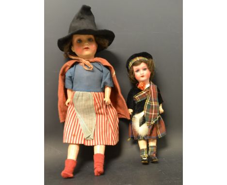 An Armand & Maseille bisque head, painted bent limbed composition bodied doll, sleeping blue glass eyes, painted features, op