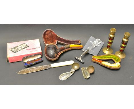 A Waterford glass handled Gents razer; a bone pipe in the form of a hand with an amber cheroot; others; a pair of miniature b