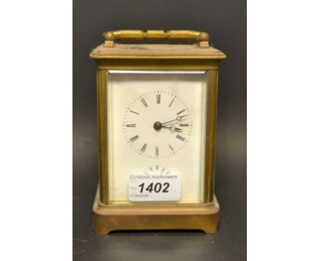 A French lacquered brass five glass carriage clock, rectangular white enamel dial, Roman numerals, subsidiary seconds dial, s