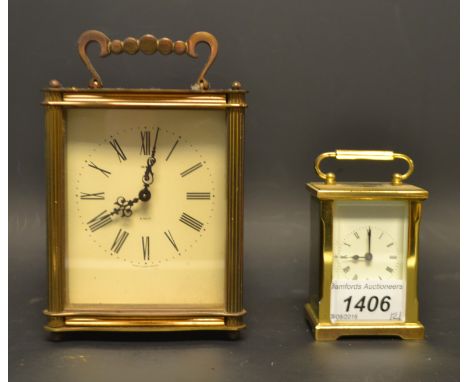 A miniature lacquered brass five glass carriage clock, 8cm high; a Smith's eight day carriage clock, 11.5cm high (2)