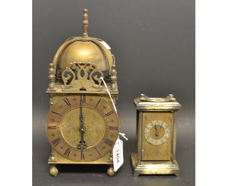 A brass lantern clock, British Made, by Empire; a British United Clock Co miniature gilt and silvered metal carriage clock (2