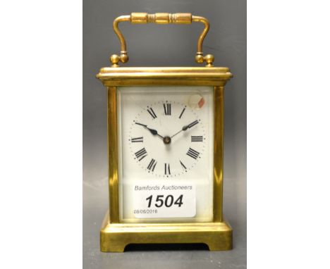 An early 20th century French lacquered brass carriage clock 
