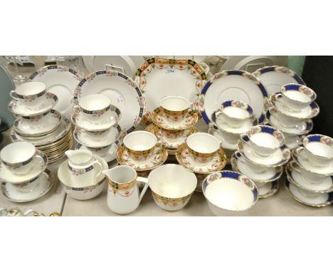 A Tuscan china tea service for twelve; another similar for six; a Staffordshire tea set (3)