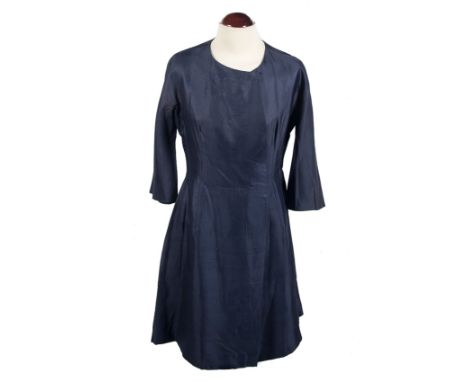 Balenciaga.&nbsp;10 Avenue George V, Paris. Haute couture. Circa 1960 - 1965. Blue shantung cocktail suit.There is a tear und