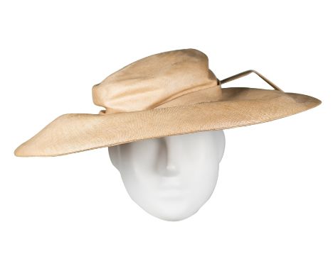 Balenciaga. 10 Avenue George V, Paris. Wide-brimmed parasisal&nbsp;straw sun hat.With hat pins and a pair of small interior c