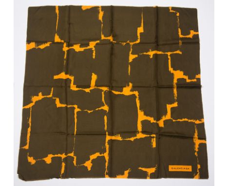 Balenciaga. Women's natural silk scarf printed with a dark brown and pale orange pattern, trimmed with a small fringe.Vintage
