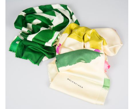 Balenciaga. Set of two women’s silk scarves, trimmed with a small fringe.In the following colours and patterns:Cream with a p