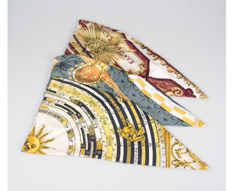 Hermès. Paris. Set of three natural silk printed headscarves.In the following shades:White, burgundy, and goldWhite, grey, go