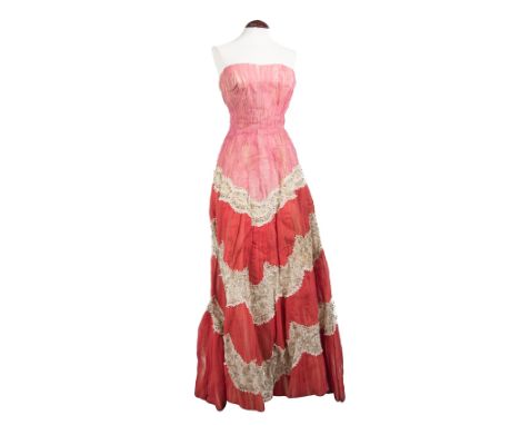 Sorelle Fontana. Rome. 1950s. Evening gown in tulle with hand-embroidered lace appliqués, with beadwork and gemstones.In good