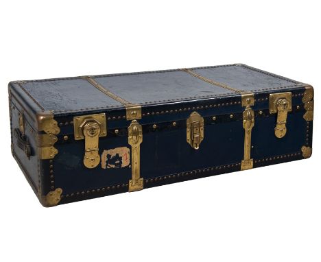 Travel trunk made of wood, metal, leather, and gilded metal fittings. 1930s.Vintage.The key is missing and the locks need to 
