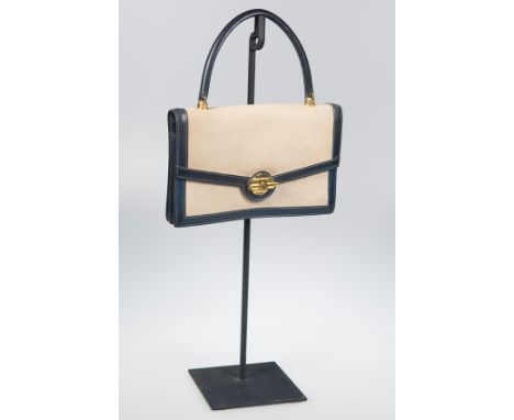 Hermès. Paris. Cloth bag with&nbsp;navy blue leather and gilt trimming. Circa 1950 - 1960.Vintage.