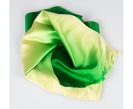 Hermès. Paris. Natural silk, long scarf with an emerald green gradient, fringed at each end.Slightly stained.Vintage.110 x 28