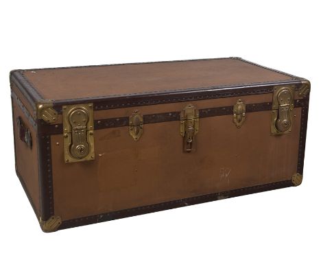 Travel trunk made of wood, metal, leather, and gilded metal fittings. 1930s.Vintage.The key is missing and the locks need to 