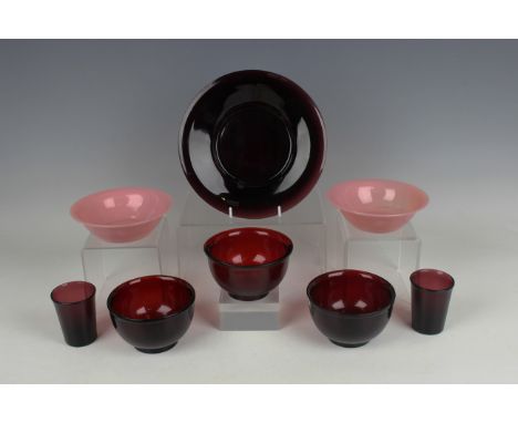 A small group of Chinese Peking glass, probably late Qing dynasty, comprising a pair of pink circular bowls, diameter 13.4cm,