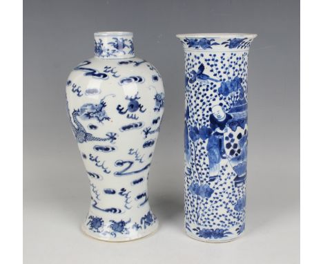 A Chinese blue and white porcelain vase, mark of Kangxi but late 19th century, the baluster body painted with a pair of oppos