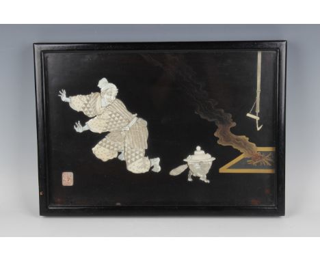 A Japanese inlaid lacquer rectangular panel, Meiji period, inlaid in carved and stained ivory, bone and mother-of-pearl, depi