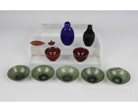 A set of five Chinese jade circular bowls, late Qing dynasty, each of hemispherical form, diameter 6.1cm, together with two C