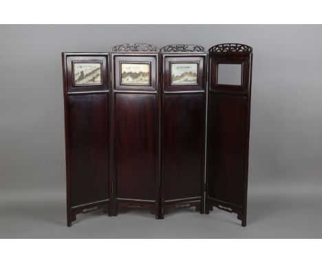 A Chinese hardwood and Huashi or Dreamstone four-fold screen, early 20th century, each section inset with a rectangular marbl