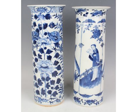 A Chinese blue and white porcelain cylinder vase, mark of Kangxi but late 19th century, painted with a pair of opposing drago