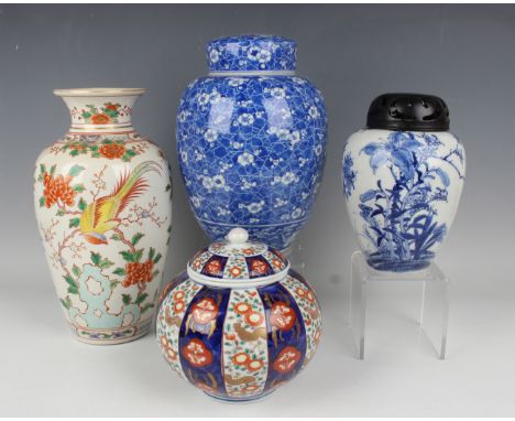 A Japanese blue and white porcelain ginger jar, Meiji period, painted with prunus on a cracked ice ground, height 25.5cm, tog