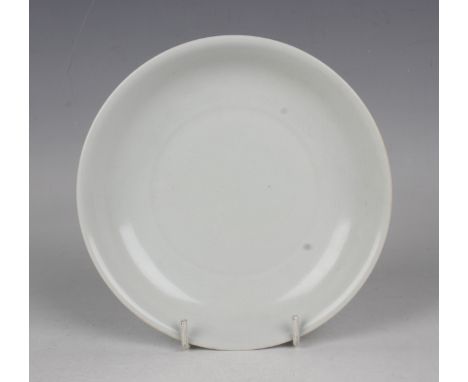 A Chinese white glazed anhua decorated porcelain saucer dish, mark of Xuande but probably 20th century, incised to the interi