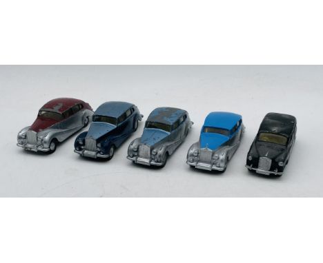 Four unboxed vintage playworn Spot-On Models Rolls Royce Silver Wraith die-cast cars, all in various two-tone colours, along 