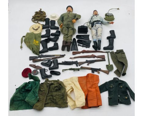 A vintage Palitoy Action Man figurine toy (dated 1964) with accessories including weapons, boots, clothing, backpack, shovel 