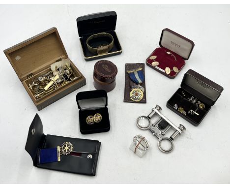 A collection of cufflinks, tie pins, opera glasses, watch etc.